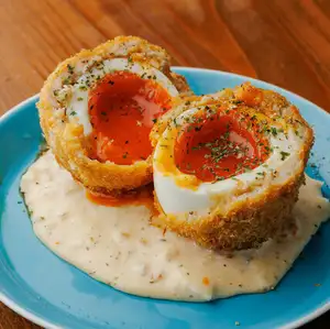 Gooey chicken meatballs with a Scotch egg
