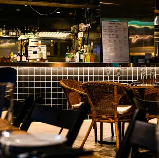 Our four-seater tables are perfect for dates! Enjoy exquisite cuisine in this sophisticated hideaway.