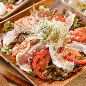 Raw ham and ripe tomato salad