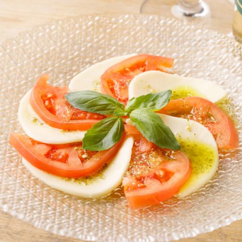 Ripe tomato and mozzarella caprese ~ basil sauce ~