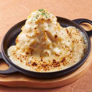 "Baked" potato salad with plenty of cheese sauce