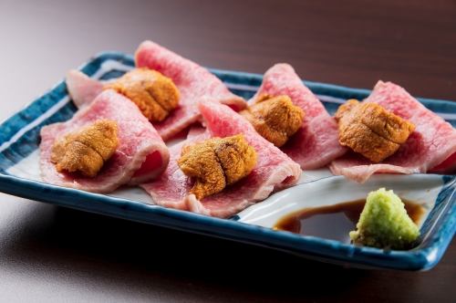 Wagyu beef sashimi topped with sea urchin