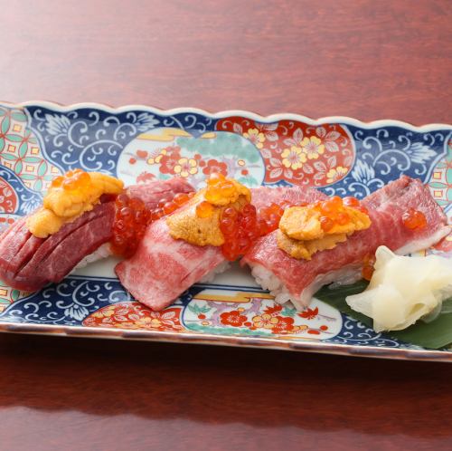 Assortment of three kinds of meat sushi
