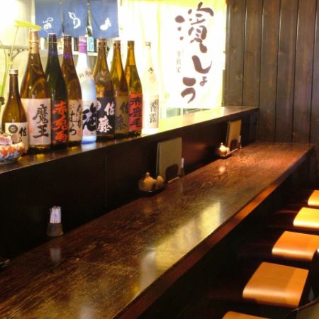 店内に入って左側にあるＬ字型の席です。