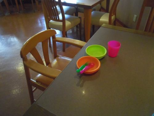 Children's chair and children's dishes are also available.