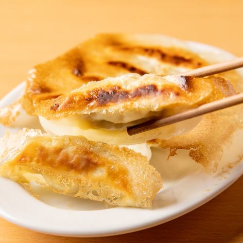 A popular dish, grilled gyoza dumplings with sangen pork wings!
