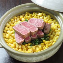 Fillet steak and corn cooked in clay pot