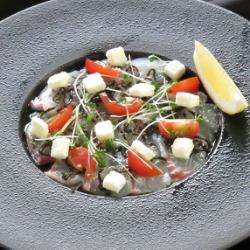 Sea bream and cream cheese carpaccio with salted kelp