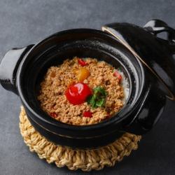 Chicken gapao rice in a clay pot