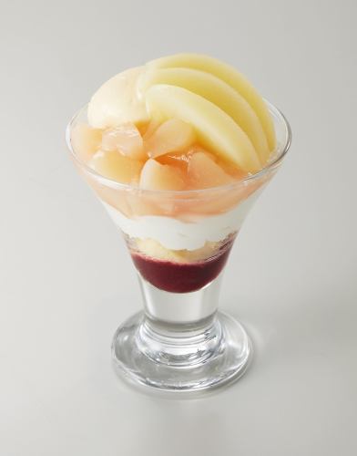 White peach parfait with chunks of fruit