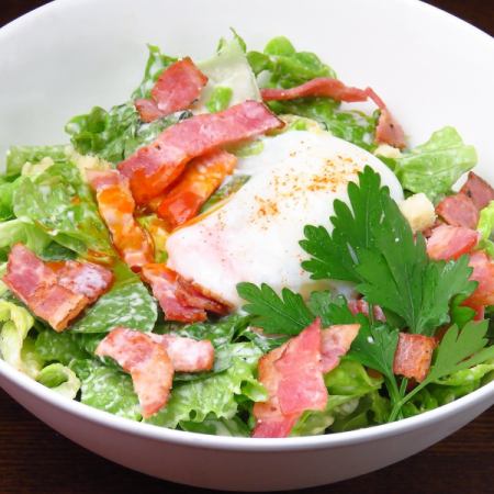 Caesar salad with hot egg