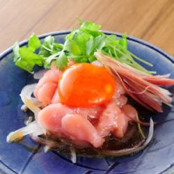 Yukhoe topped with smoked egg