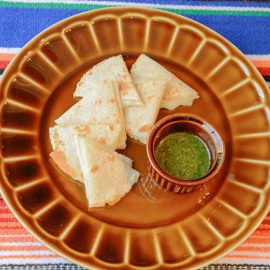 Quesadillas de Comal Grilled tortillas stuffed with cheese