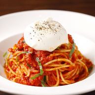 Spaghetti with burrata cheese and tomato sauce