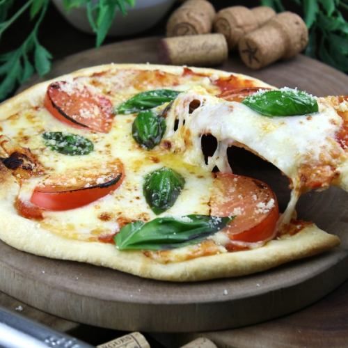 Luxury margherita with grilled tomatoes and mozzarella