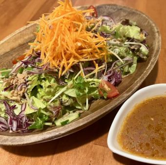 Homemade tomato and carrot dressing salad