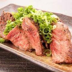 Grilled beef skirt steak with green onion ponzu sauce