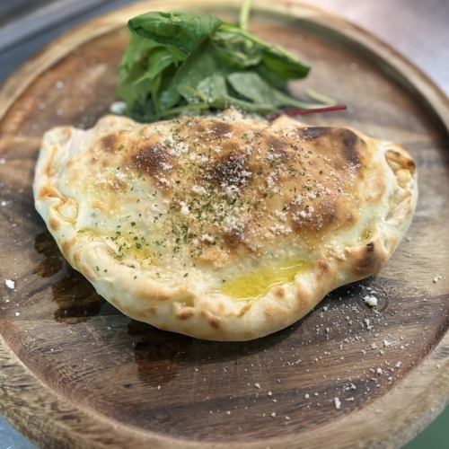 Salmon cream calzone (wrapped pizza)