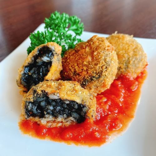 Rice croquette of squid ink risotto