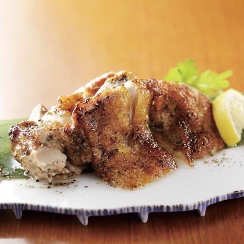 Grilled chicken thigh with black pepper