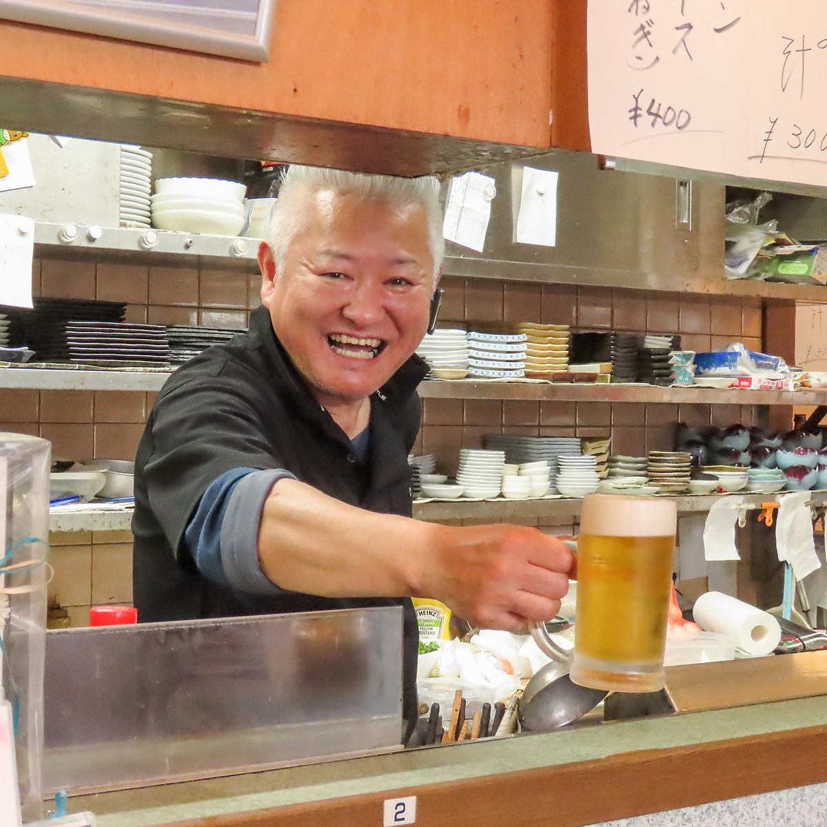 Our shop has a friendly atmosphere, and customers are chatting with each other.