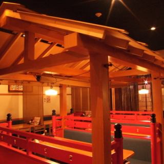 Semi-private room table seats with the image of a torii