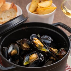 Plenty of mussels steamed in wine
