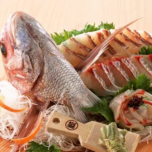 Specialty "live sashimi of sea bream"