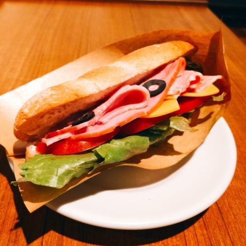 HUMSAND (ham, cheese, tomato, olives, French bread, mustard mayonnaise)