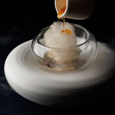 Enjoy innovative cuisine cooked over a wood fire.