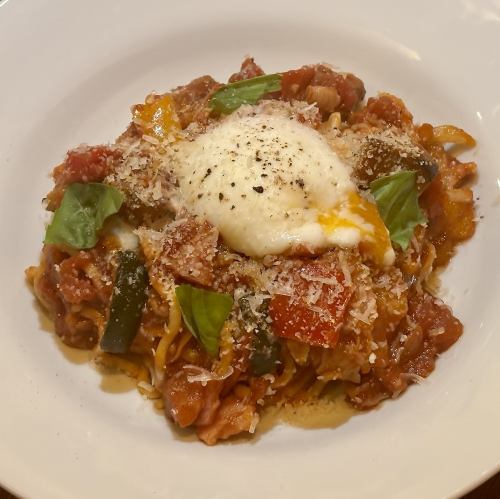Tomato pasta with soft-boiled eggs, bacon and seasonal vegetables