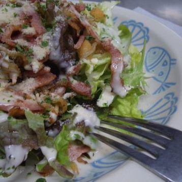 Caesar salad with dried baby sardines and egg