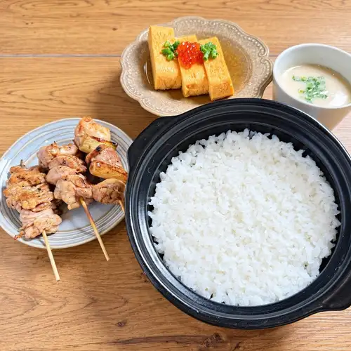 Fluffy rolled omelet and charcoal-grilled chicken set meal