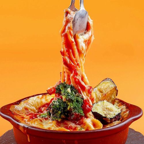 Tomato sauce volcano pasta with bacon and fried eggplant