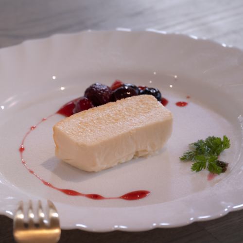 Torta di Formaggio made with 4 types of cheese with berry sauce