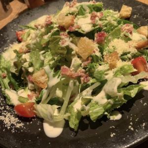 Caesar salad with gourds and croutons