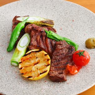 Thickly sliced grilled beef tongue