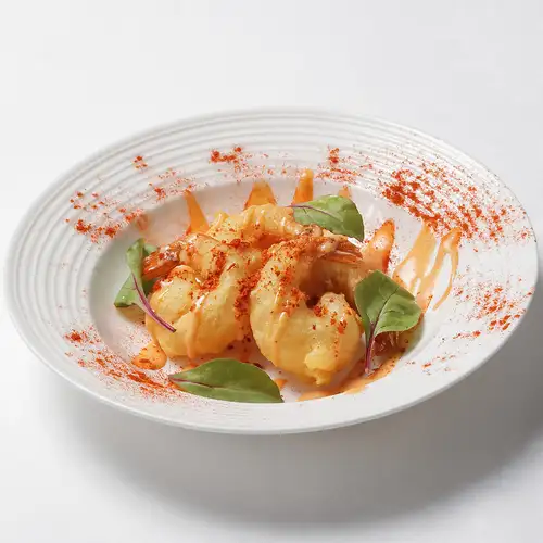 Plump shrimp fritters with aurora sauce