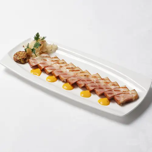 Thick-cut bacon grilled from whey-fed pork