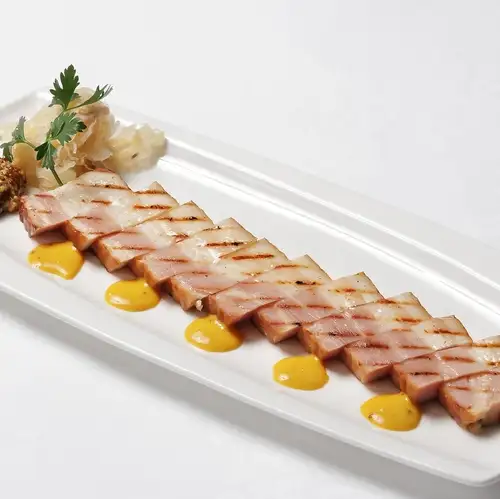 Thick-cut bacon grilled from whey-fed pork