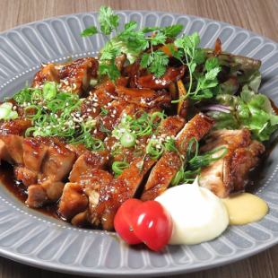 Japanese-style teriyaki chicken with special sweet sauce and fragrant Japanese pepper