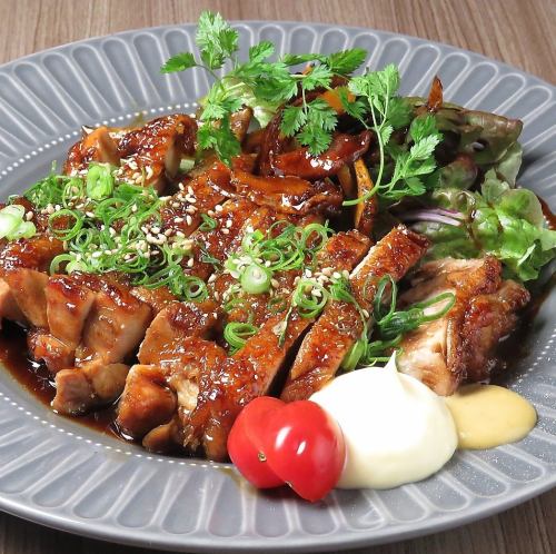 Japanese-style teriyaki chicken with special sweet sauce and fragrant Japanese pepper