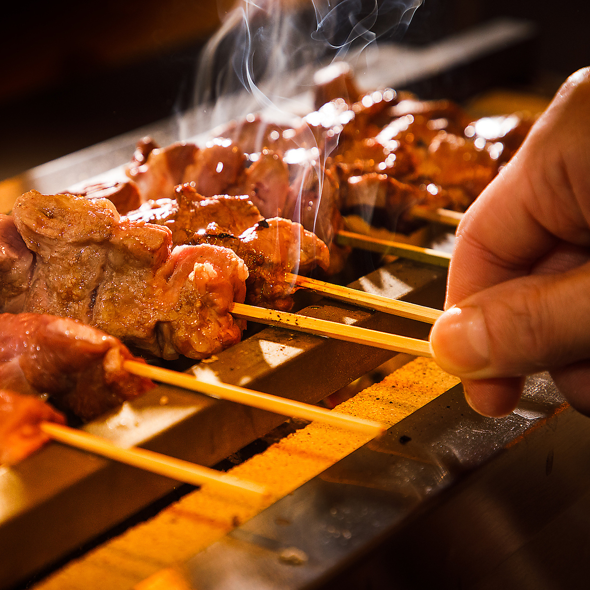 A pub specializing in grilled offal, complete with tabletop beer servers!