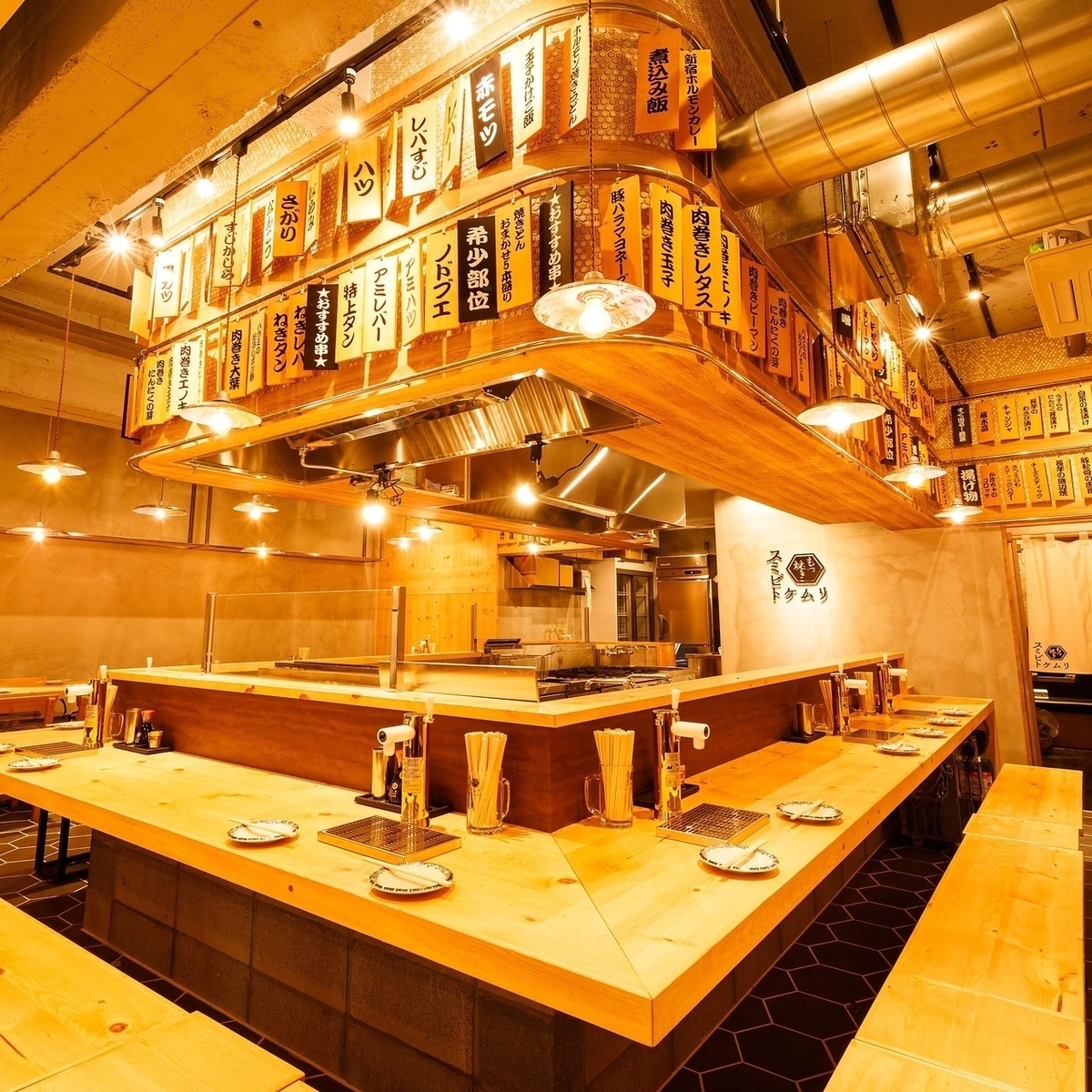 A pub specializing in grilled offal, complete with tabletop beer servers!