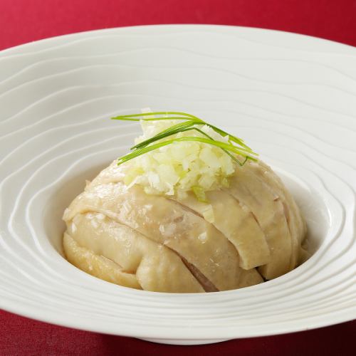 Steamed chicken with spring onion ginger sauce