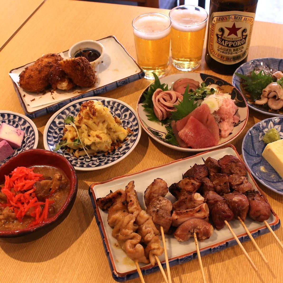 仕事後の一杯。もつ焼きが身体に染みわたります。