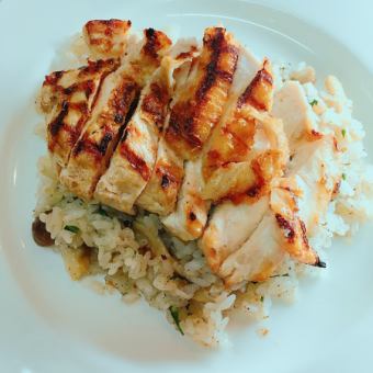 Garlic rice topped with grilled chicken