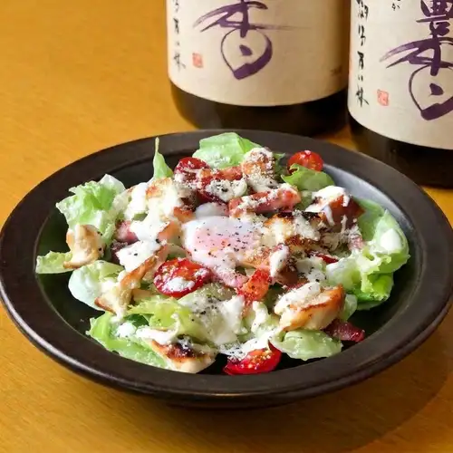 Seared thick-cut bacon and soft-boiled egg Caesar salad