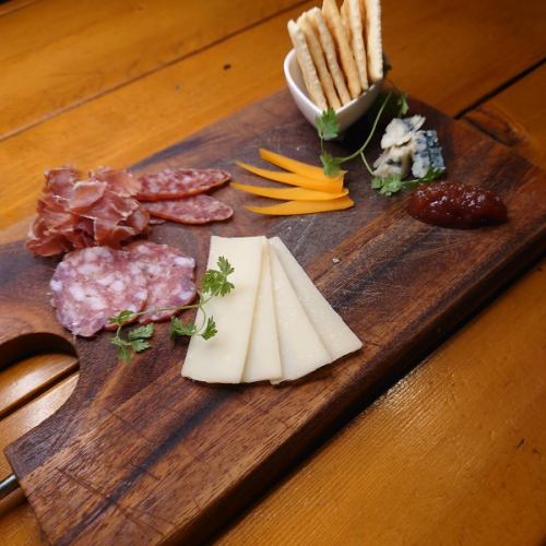 Platter of uncured ham, salami and cheese