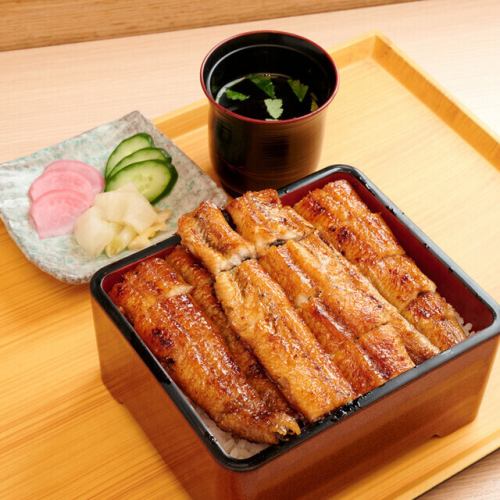 Japanese Unaju (Top) 1.5 eels used, served with pickles, miso soup and a small dish of liver